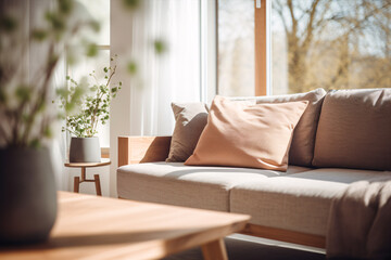 A crisp living room with couch and table in foreground, hazy backdrop.