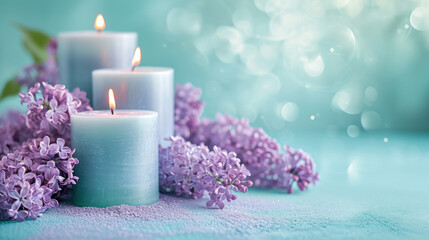 Obraz na płótnie Canvas Lilac scented aroma burning candles with lilac flowers on a blue background 