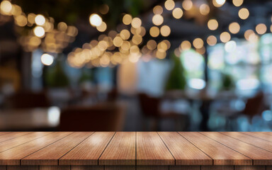 Empty wooden table top with lights bokeh on blur restaurant background. - obrazy, fototapety, plakaty