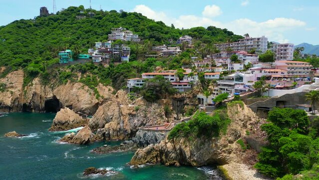 Drone Video: Side View of Acapulco's La Quebrada Cliff Diving