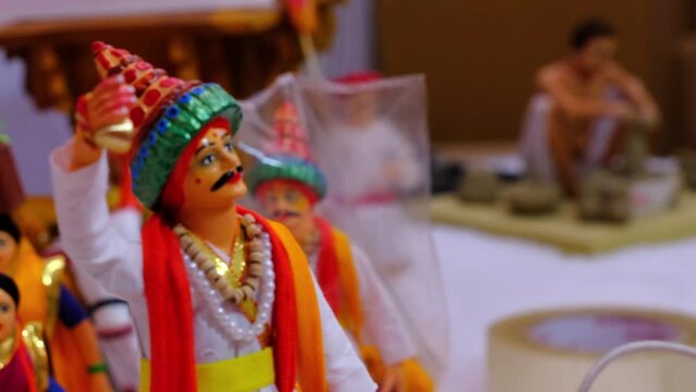 22 Dec. 2023, Vasudev miniature statue, a community of Krishna worshippers from Maharashtra, sing bhakti songs, and survive on alms given by the people, Vasudev in Bhimthadi Jatra 2023, India.