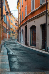 Fototapeta na wymiar narrow colorful street in old town