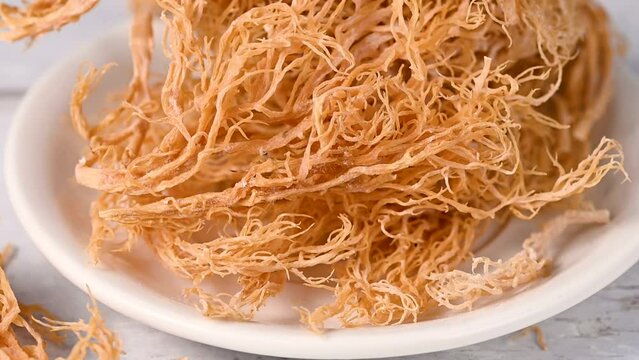 Sea Moss, closeup dried seaweed, used as food supplement.