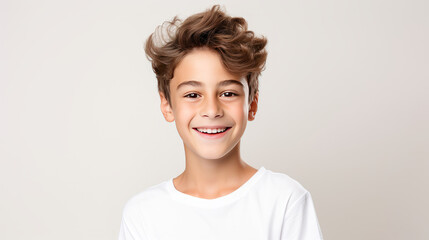 close-up portrait photo of a charming young boy smiling, showcasing his clean teeth, designed for a dental advertisement. stylish hair. Isolated on a white background