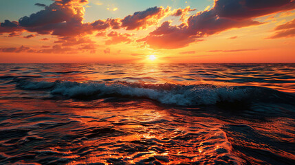 Fototapeta premium A picturesque sunset at sea, where warm orange and pink paints are smoothly merged in water