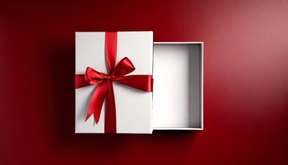 blank white gift box open or top view of white present box tied with red ribbon bow on dark red background with shadow minimal conceptual 3d rendering