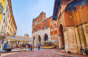 The market stalls on Piazzetta Grida, Piacenza, Italy