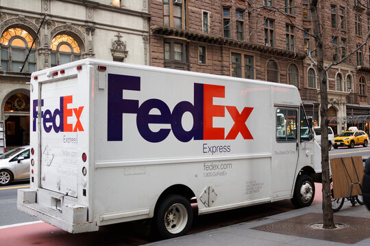New York, New York, USA - January 11, 2024: A FedEx truck on 57th Street in Manhattan.