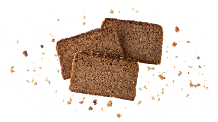 Cutting slices of dark rye cereal bread with crumbs flying isolated on white background.