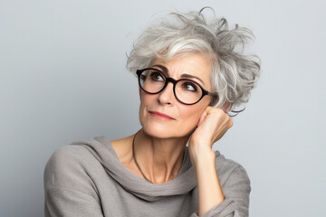 senior old woman doubtful, thinking or choosing concept