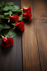 red roses on wooden background