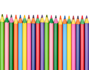 colored wooden pencils on white background