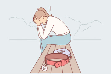 Woman who lost dog cries over loss of beloved pet, sits on bench with empty collar in public park