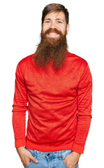 Redhead man with long beard wearing casual clothes with a happy and cool smile on face. lucky person.