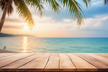 Top of wood table with seascape and palm tree, blur bokeh light of calm sea and sky at tropical beach background