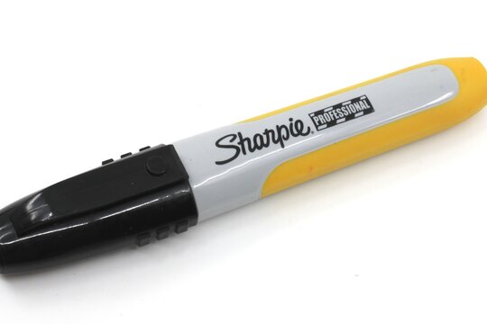 Permanent writing marker. Sharpie brand writing marker. 