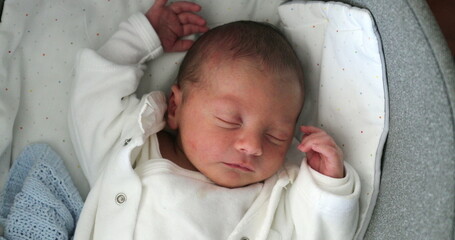 Newborn baby sleeping. Cute adorable infant asleep