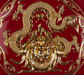 golden chinese dragon pattern on red background