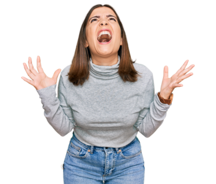 Young beautiful woman wearing casual turtleneck sweater crazy and mad shouting and yelling with aggressive expression and arms raised. frustration concept.