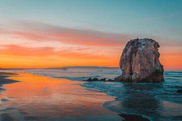 Sunset Sea Stack at beach - 710025053