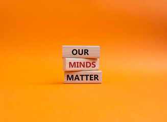 Our Minds Matter symbol. Concept words Our Minds Matter on wooden blocks. Beautiful orange background. Psychological social and Our Minds Matter concept. Copy space.