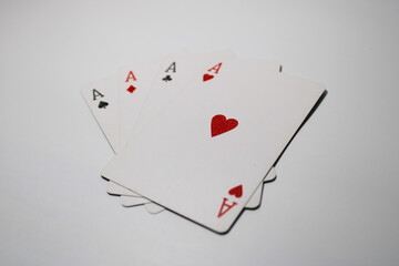 Four aces playing cards isolated on white background