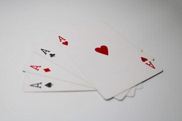 Four aces playing cards isolated on white background