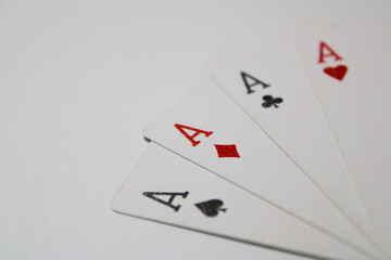 Four aces playing cards isolated on white background