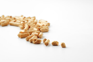 Wood pellets biofuel isolated on white background