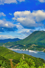 Fototapeta na wymiar View of the town, harbour and surrounding hills of Picton, South Island, New Zealand, from the walking trail over the peninsula The Snout 