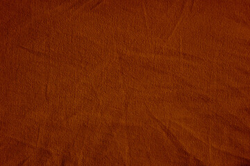 Dark deep burnt orange red brown terracotta texture background for design. Wrinkled crumpled...