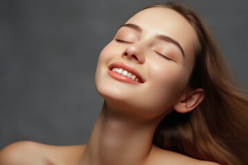 Obraz premium Young woman enjoys Vitamin C for skin with orange