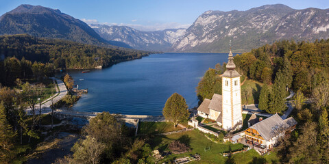 San Juan Bautista Church and Romanesque bridge. ,Lake Bohinj in Triglav National Park, julian alps, Slovenia, Central Europe,