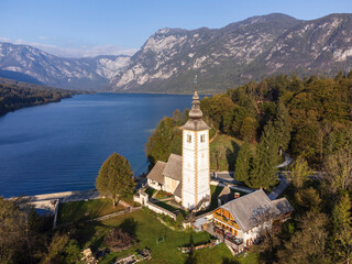 San Juan Bautista Church and Romanesque bridge. ,Lake Bohinj in Triglav National Park, julian alps, Slovenia, Central Europe,