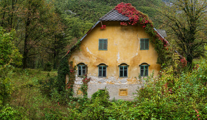 Fototapeta na wymiar old abandoned house, Bavšica Valley in Triglav National Park, Bovec, Julian Alps. Slovenia, Central Europe
