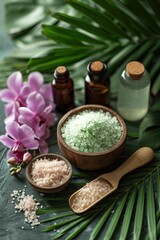 Obraz na płótnie Canvas Herbal spa tropical ingredients with scrub body salt, flowers, green leaves