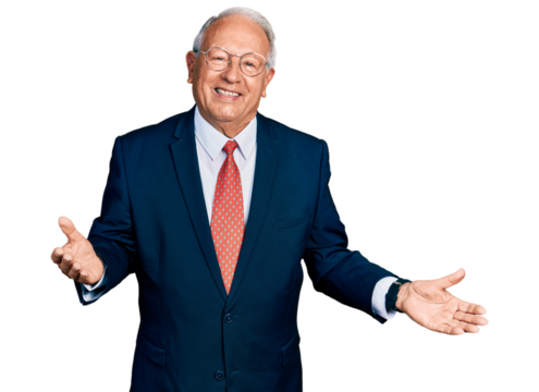 Senior man with grey hair wearing business suit and glasses smiling cheerful with open arms as friendly welcome, positive and confident greetings