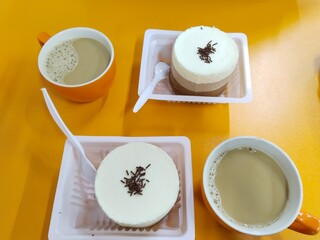 cup of coffee with cupcakes 