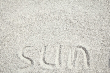 A drawing on the sand by the sea travel background