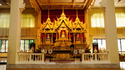 Golden buddha statue in Thakhanun temple of  Kanchanaburi Province,Thailand.Thailand travel concept.