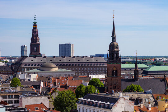 Christiansborg Slot Palace, Church of Holy Ghost, Nikolaj Kunsthal Contemporary Arts Centre and historical buildings in center of Copenhagen, Denmark. View from Round Tower (Danish: Rundetaarn)