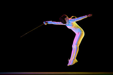 Strength and grace. Combination of strength and grace necessary in the art of fencing. Female...
