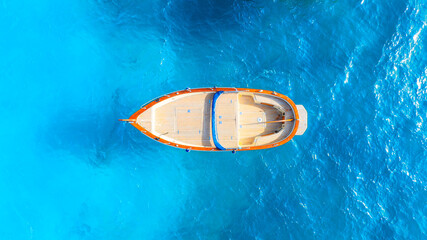 Drone view of a motor boat. Luxury transportation. Vacation and holidays. Summer time for sea travel. The sea bay. Photo for background and wallpaper. Mediterranean Sea.