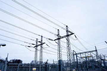 High voltage power lines at a transformer substation.