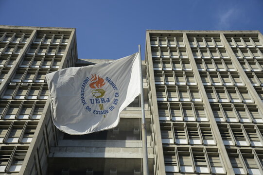 State University of Rio de Janeiro (UERJ), Maracan&atilde; campus, facade of the main building, general view with flag and logo - Rio de Janeiro, Brazil 01.09.2024