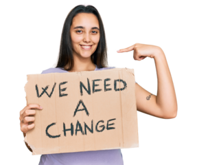 Young hispanic woman holding we need a change banner pointing finger to one self smiling happy and proud