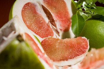 pieces of red Pomelo fruit, selective focus