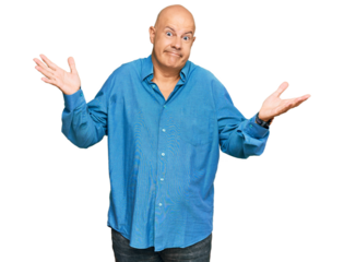 Middle age bald man wearing casual clothes clueless and confused expression with arms and hands raised. doubt concept.