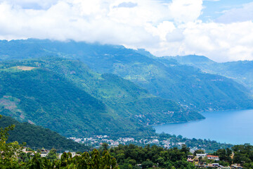 beautiful mountains surrounded by a lake