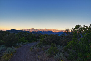 Obraz premium Lone Peak hiking trail view and surrounding landscape from Jacob’s Ladder, Wasatch Rocky Mountains, Utah, United States.
